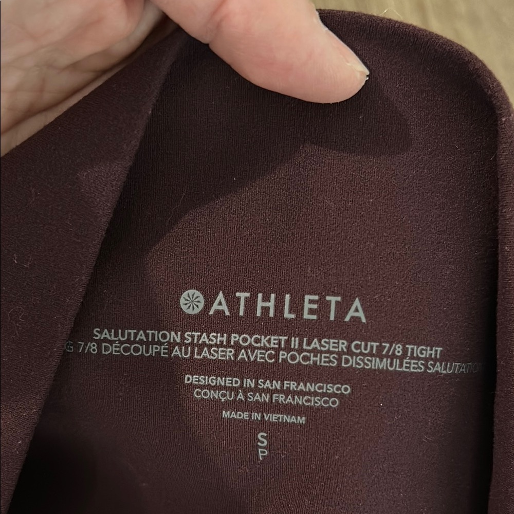 Worn once - ATHLETA Salutation Stash Pocket Laser Cut 7/8 Tights - Picture 2 of 6